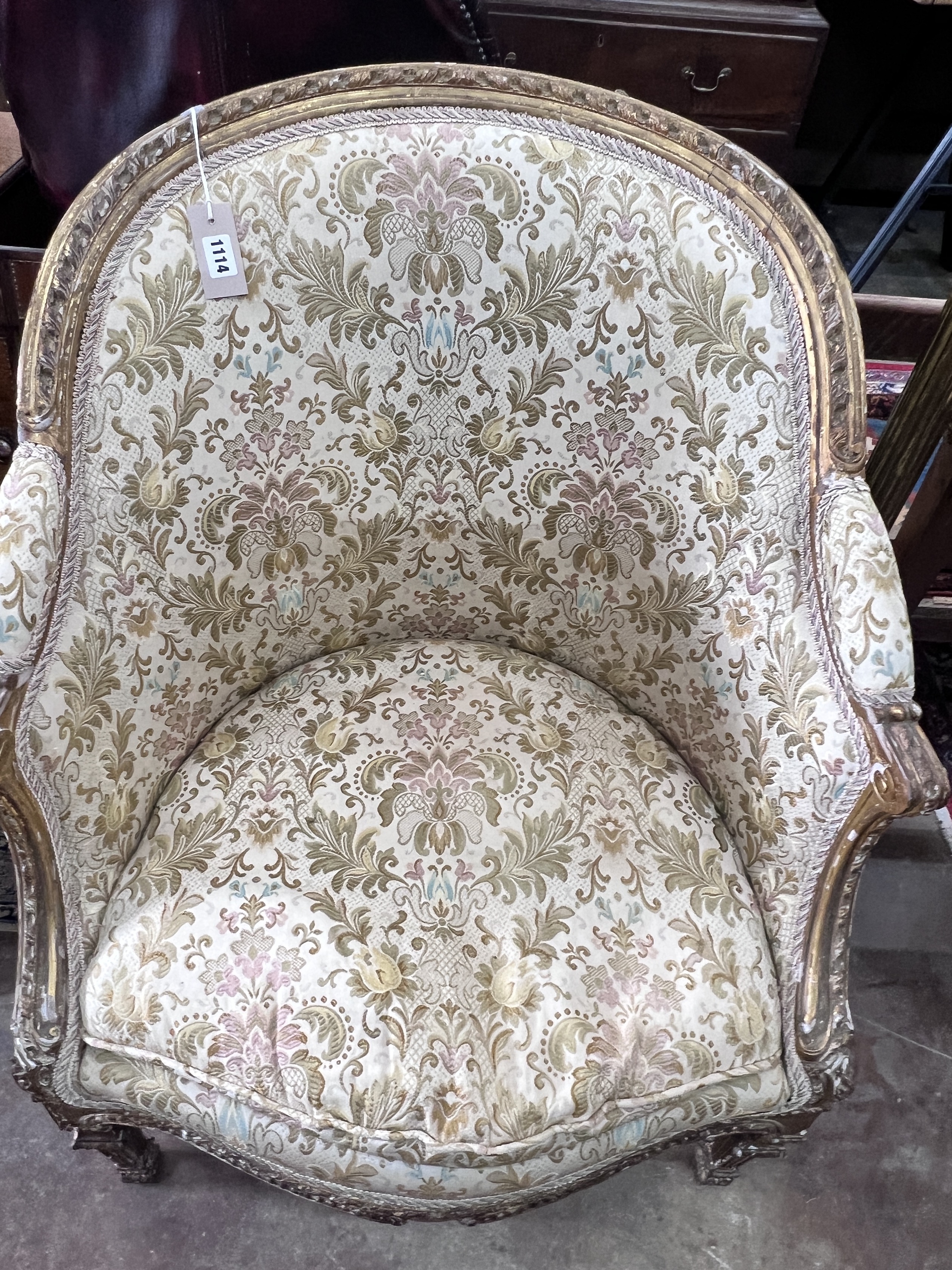 A 19th century French giltwood tub framed chair, width 71cm, depth 55cm, height 96cm